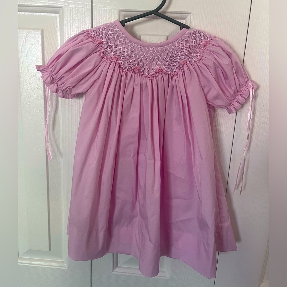 Pink smocked dress with ribbon ties 9 mo
